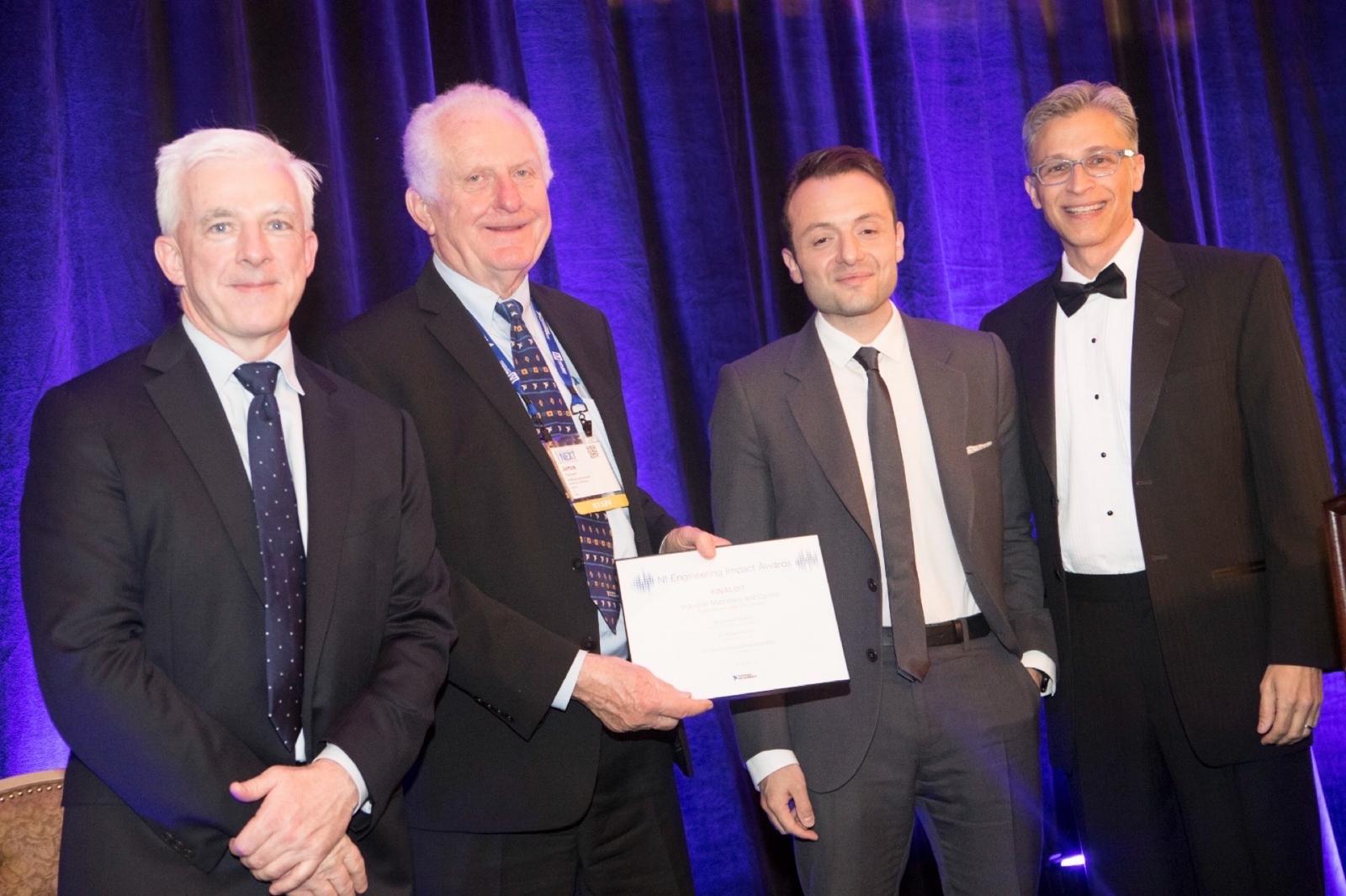 Gennaro Senatore receives the National Instruments Engineering Impact Award certificate