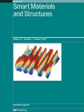 Shape control and whole-life energy assessment of an 'infinitely stiff' prototype adaptive structure
